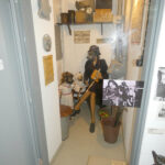 Staged depiction of civilian daily life with gas masks during air raids in Nazi Germany