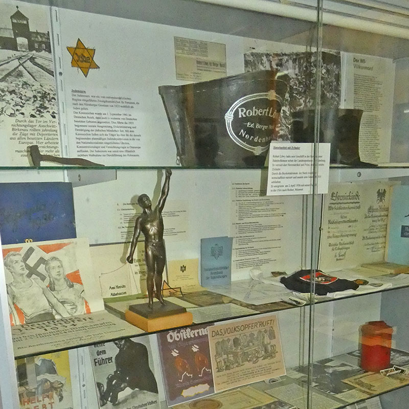 Title image on the topic of life in the Third Reich with exhibits in the museum.